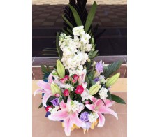 T69 TIGER LILIES, ESTOMAS, ROSES WITH WHITE MATCHING FLOWERS TABLE DISPLAY